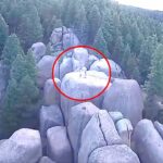 This Drone Made A Chilling Discovery After Spotting This High Up On A Mountain Boulder